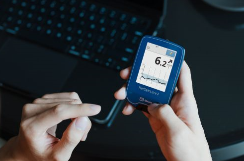 “FreeStyle Libre reader showing a glucose reading