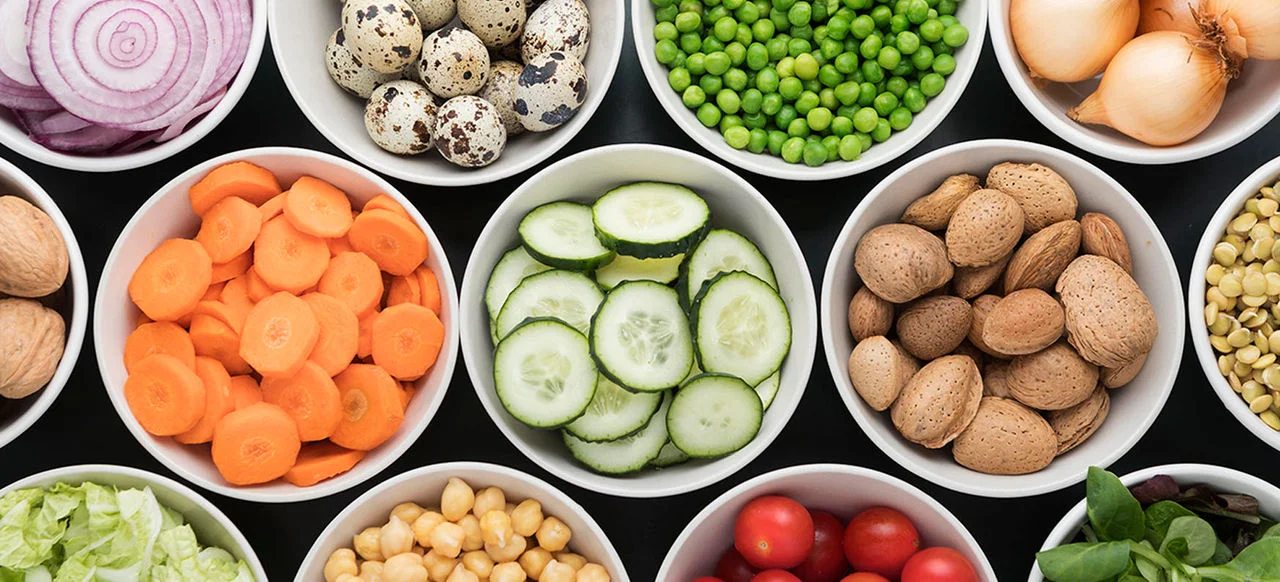 Group of friends taking a wefie over a meal