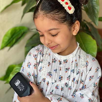 Girl taking glucose reading