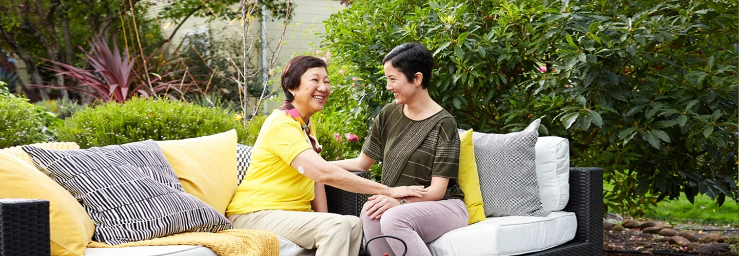 Women chatting on patio
