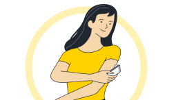 Person scanning an upper-arm glucose sensor with a smartphone.