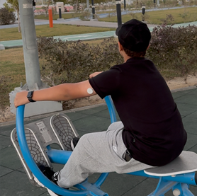 Boy wearing sensor at a playground