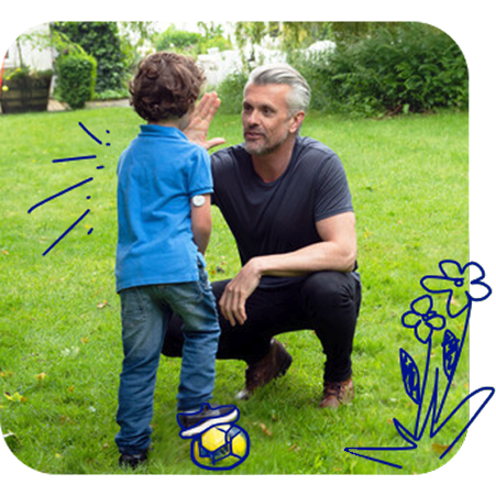  Illustration of a child wearing a CGM sensor on the upper arm, standing on grass and high-fiving an adult kneeling nearby, with doodled flowers and a soccer ball.