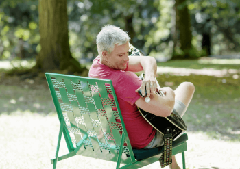 Man scanning his FreeStyle Libre sensor on his arm