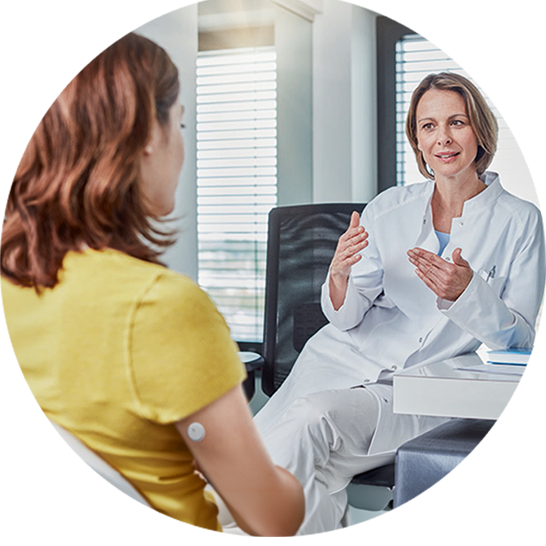 Woman speaking with her healthcare provider