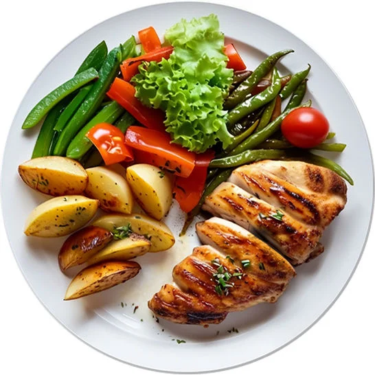 Grilled chicken breast served with roasted potatoes and mixed vegetables on a white plate.