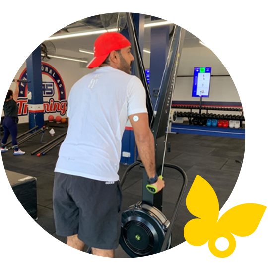 Man wearing a sensor while weight lifting