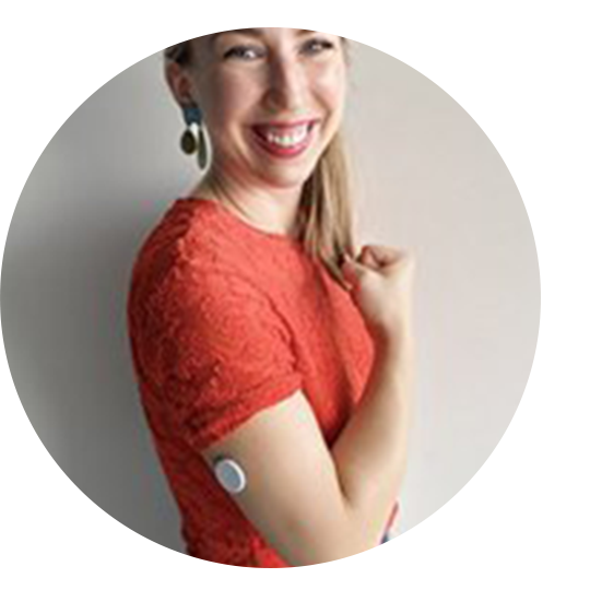 A man with tatoos wearing a sensor while eating.