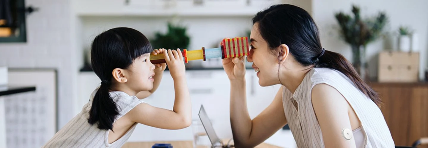 mother and daughter playing