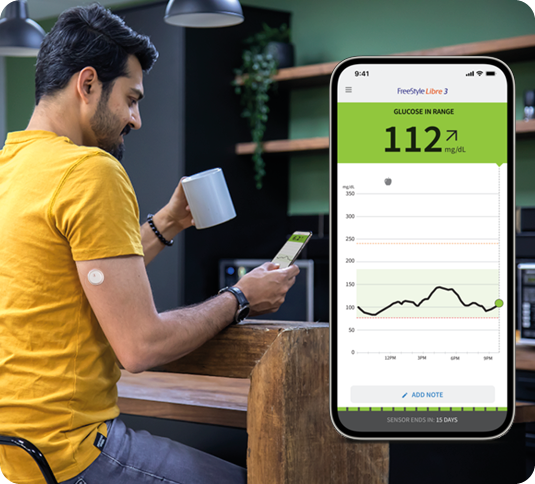 A man wearing a FreeStyle Libre sensor looking at his app next to an inset image of the smartphone app screen.
