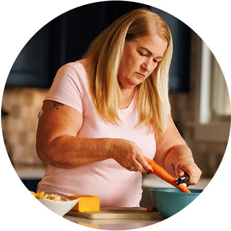 A woman cooking in the kitchen 