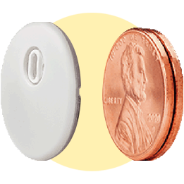 Sensor shown beside a U.S. penny for size comparison.