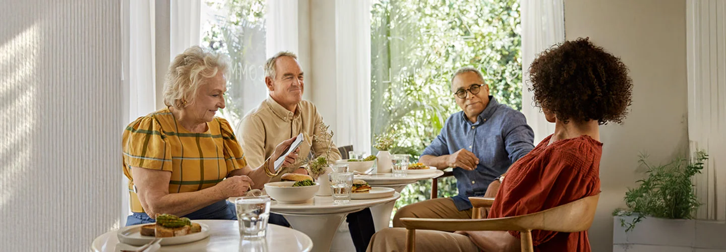 A group of elderlies having lunch together 