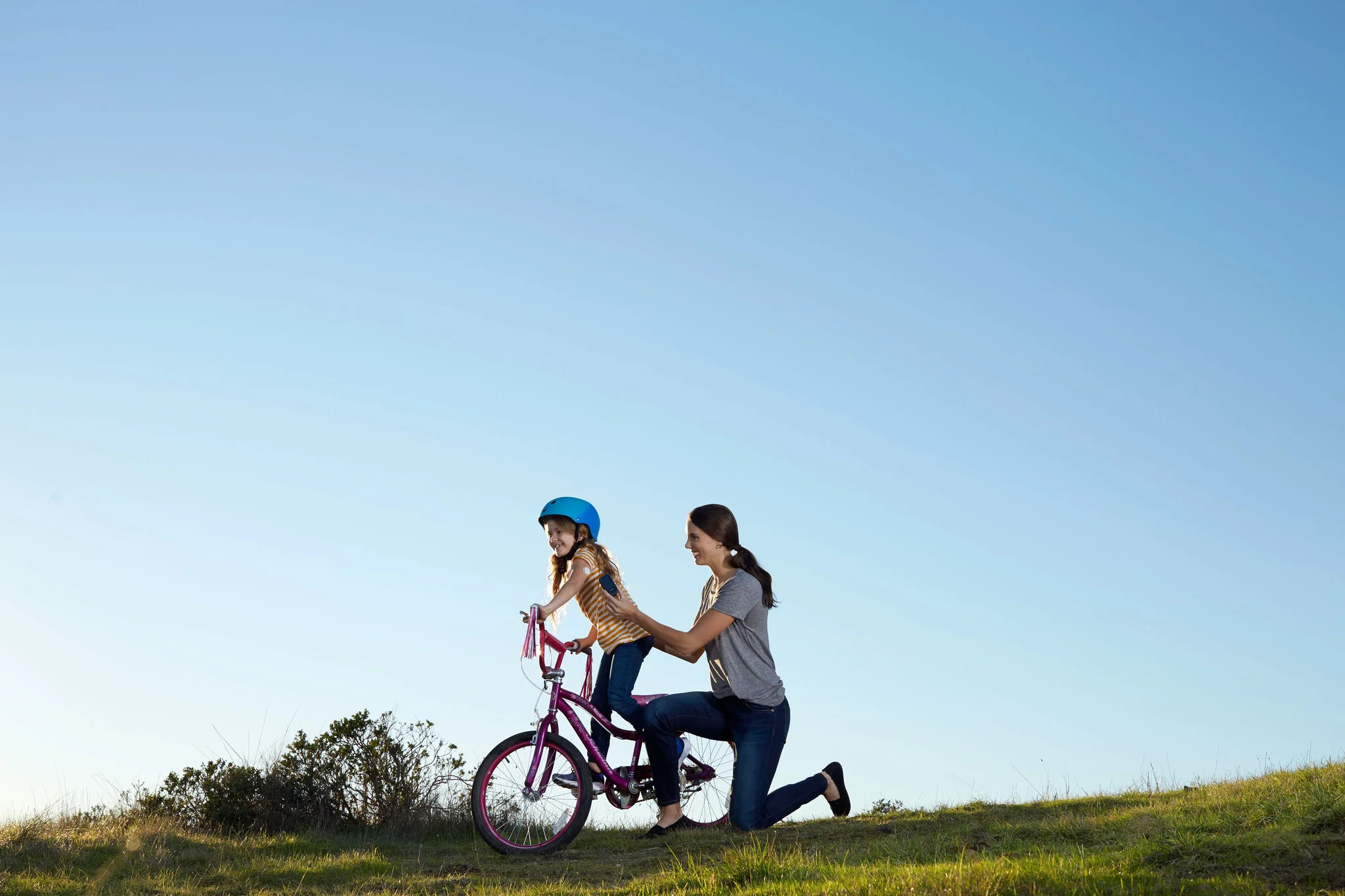 Family bonding together at their yard playground