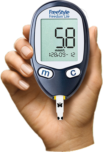 Hånd der holder FreeStyle Lite blodsukkermåler