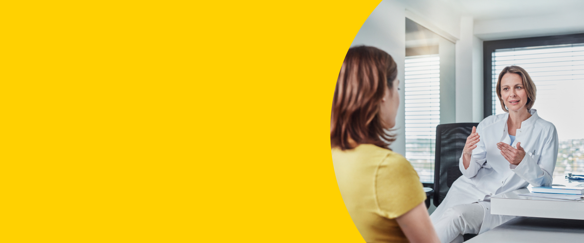 Woman talking to a doctor