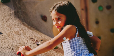 Child wearing a FreeStyle Libre 3 Plus sensor and Omnipod® 5 insulin pump