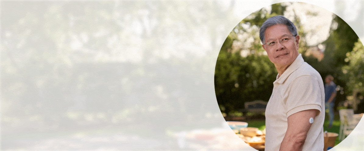 Man standing outdoors wearing a FreeStyle Libre 2 sensor