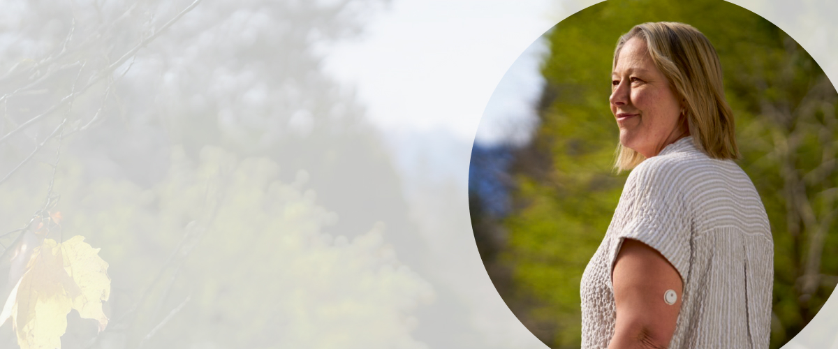 Woman outdoors wearing a FreeStyle Libre 3 Plus sensor