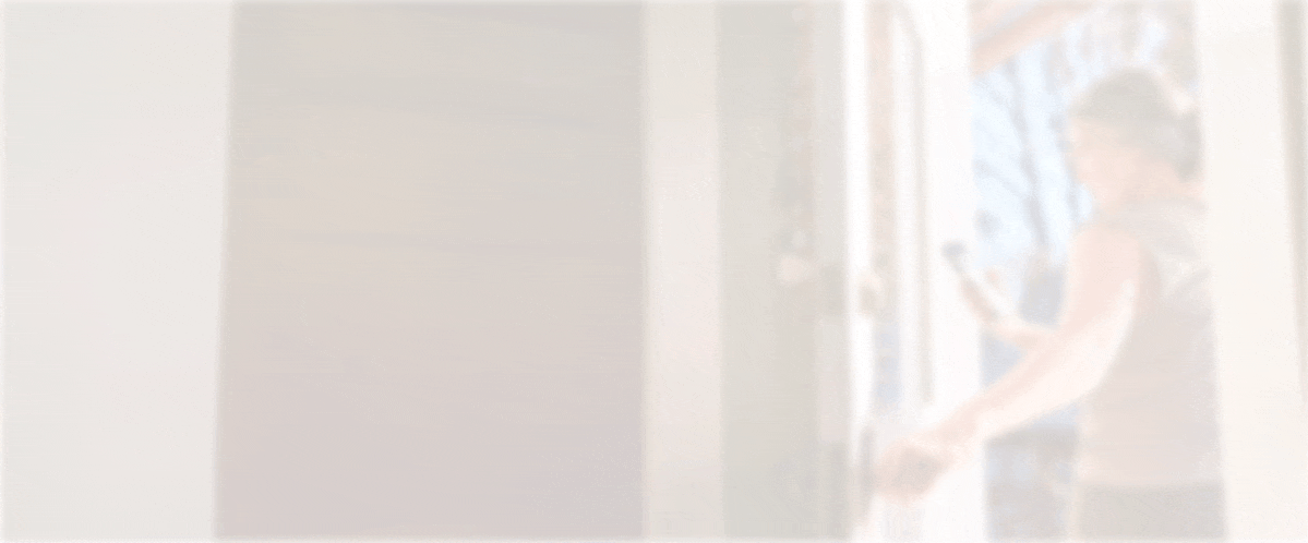 Woman checking her blood glucose on her smartphone as she walks out the door