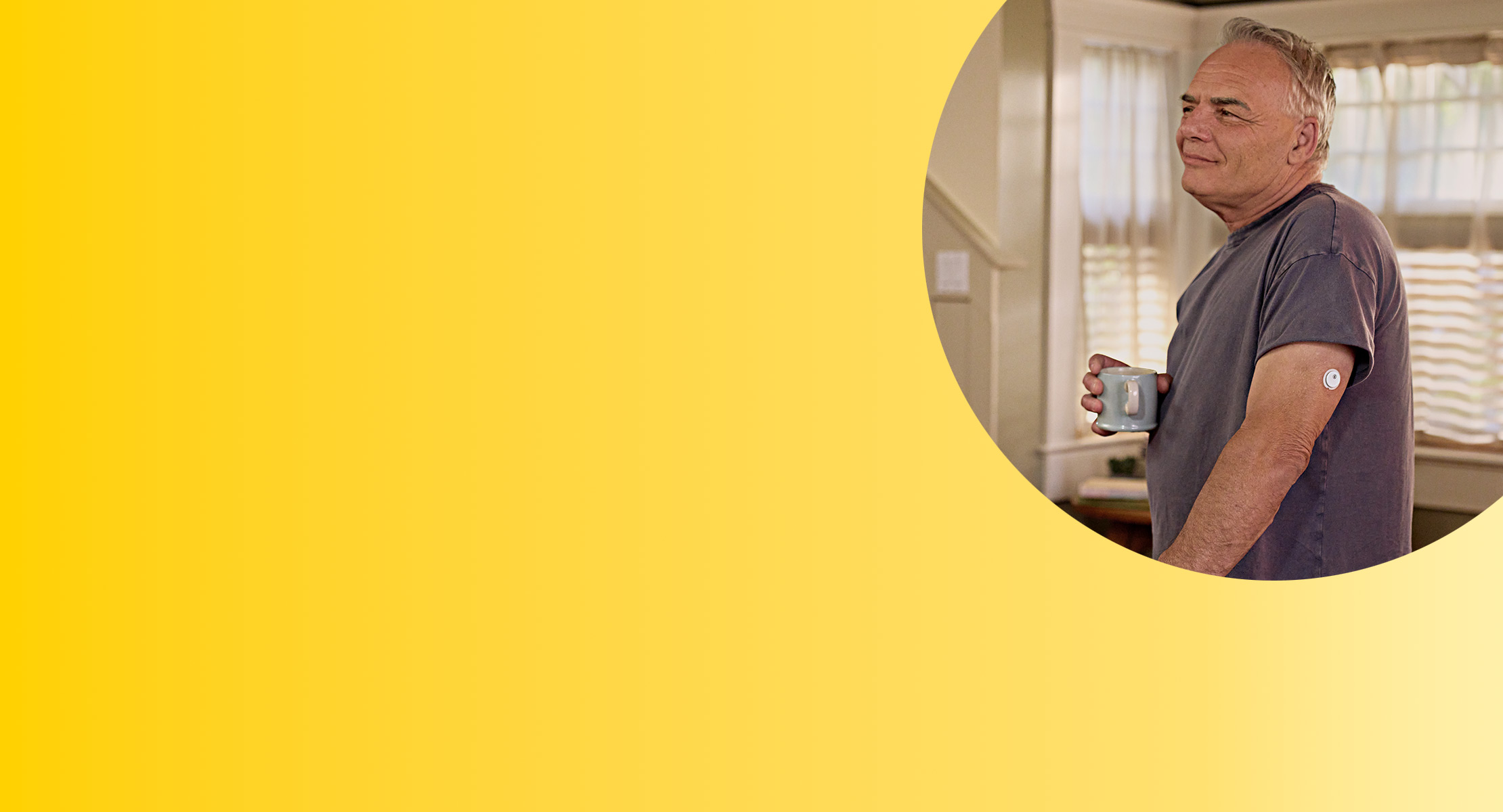 Man in a kitchen wearing Libre 3 Plus sensor