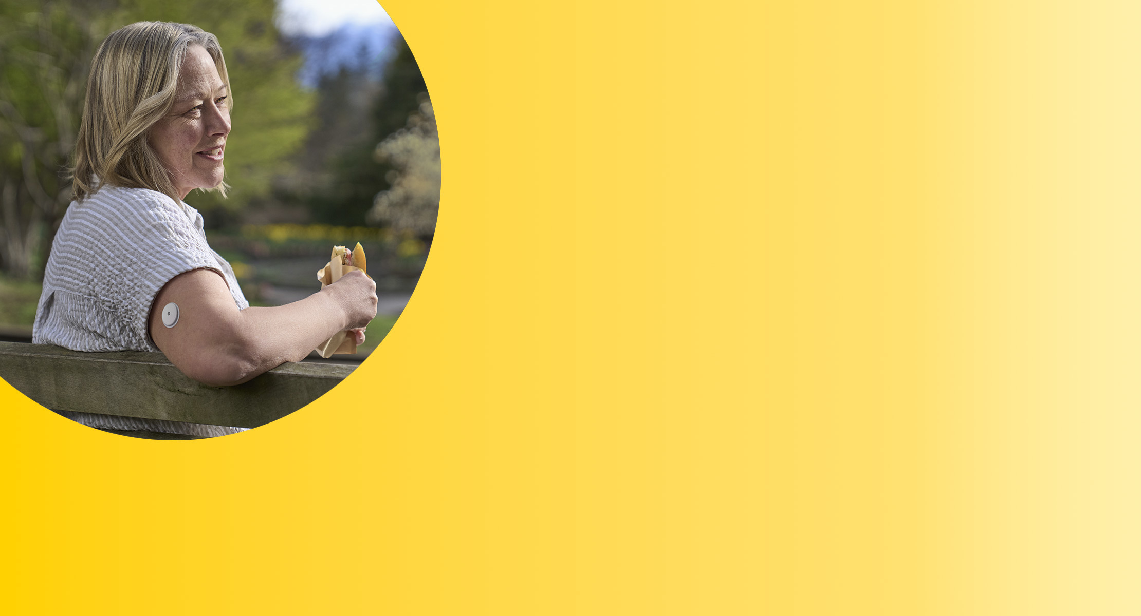 FreeStyle LibreLink home screen shown on a smarphone next to FreeStyle Libre 2 Plus sensor