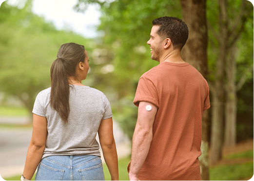 an image of a couple walking outdoors