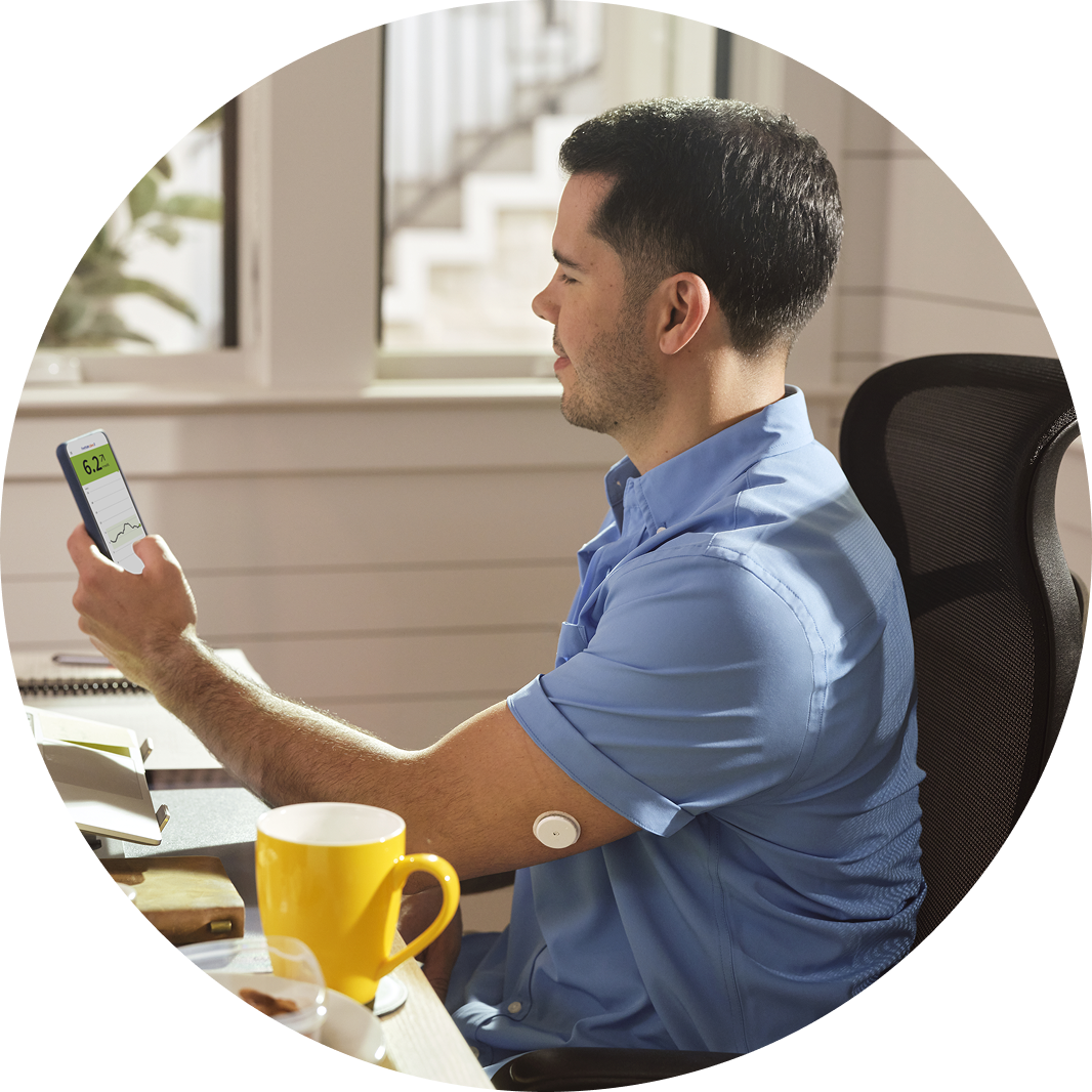 Man reviewing his LibreLink app data
