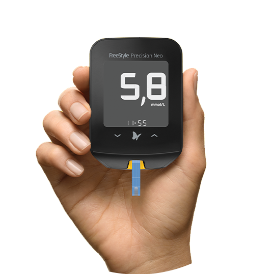 Hånd holder glukosemåler med aflæsning på 6,2 mmol/L