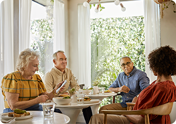 A group of elderlies having lunch together