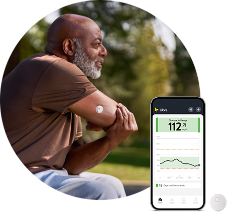 Man outside wearing a FreeStyle Libre sensor