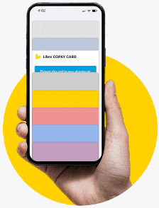 Hand holding a phone showing the FreeStyle Libre copay card in Apple Wallet