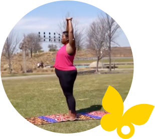 Woman stretching in the park wearing a FreeStyle Libre 3 Plus sensor