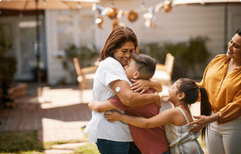 Woman with FSL2 sensor hugging children