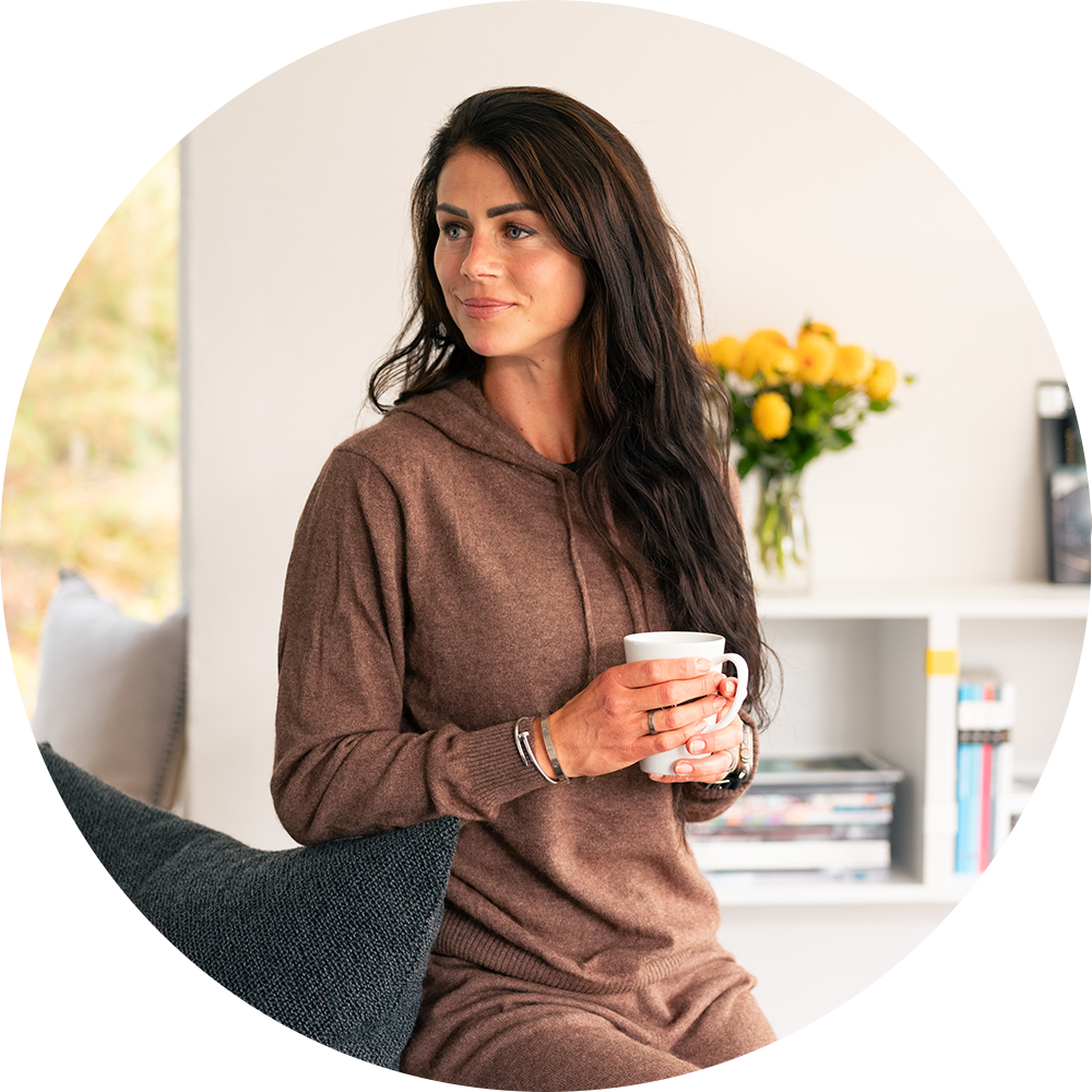 A woman holding a tea cup