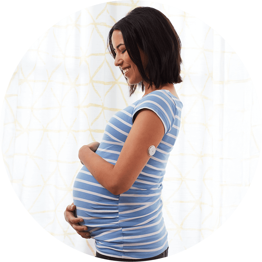 Pregnant woman wearing a FreeStyle Libre sensor