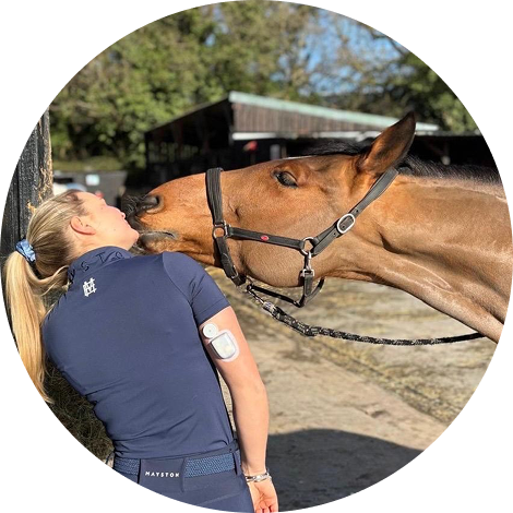 Mark, blog author, smiling in blue medical scrubs