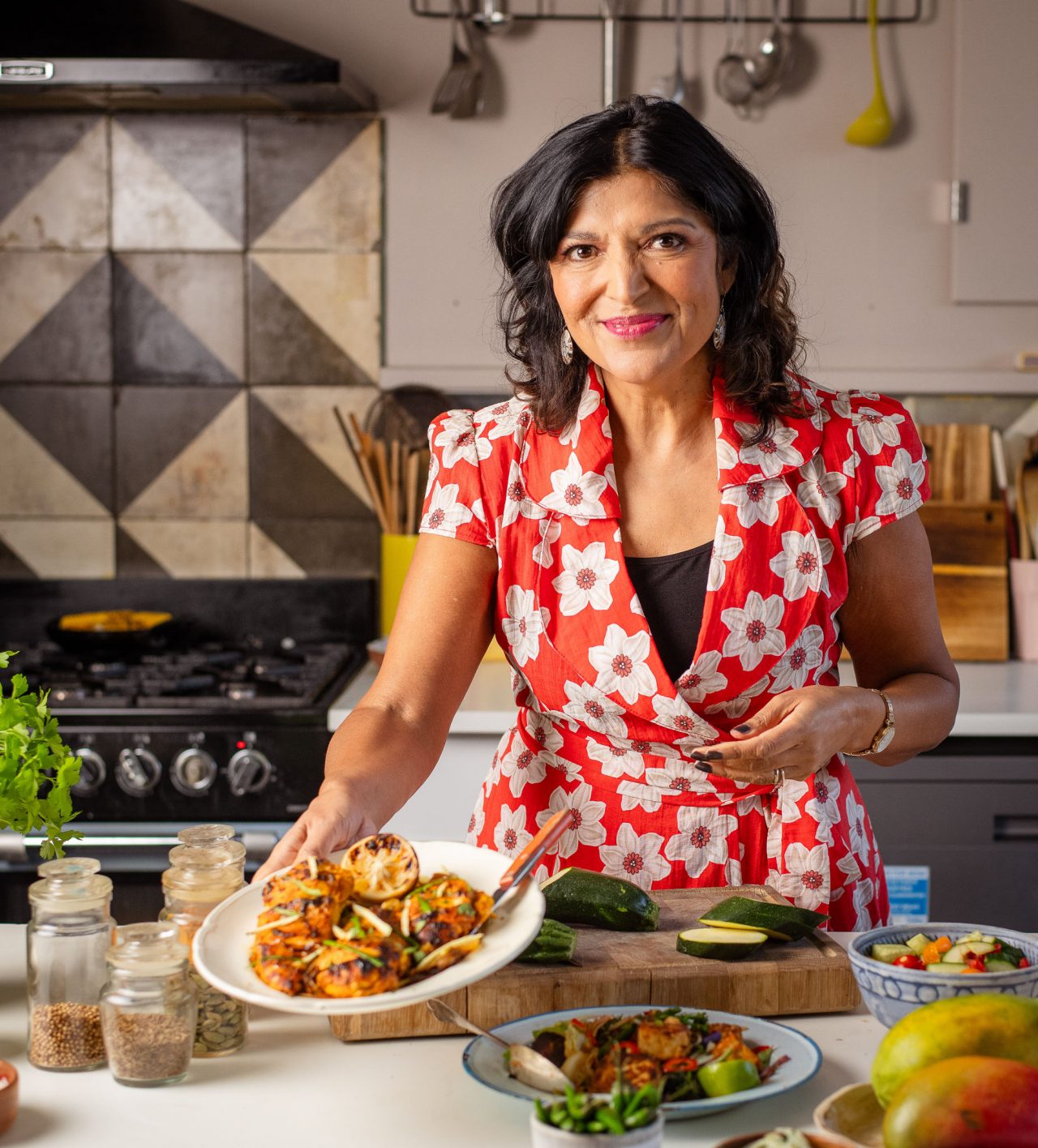 Azmina, blog author, standing in the kitchen and making food