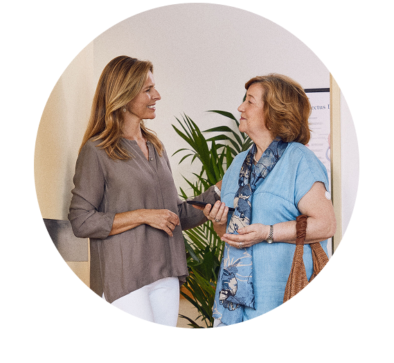 Woman with sensor talking to her HCP