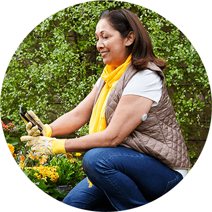 Women with Libre 2 sensor gardening