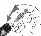 A hand inserting lancet into lancet hold.