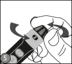 A hand twisting to set depth setting.